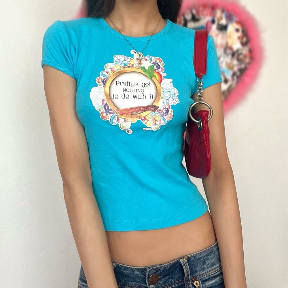 “Pretty’s got nothing to do with it” baby tee